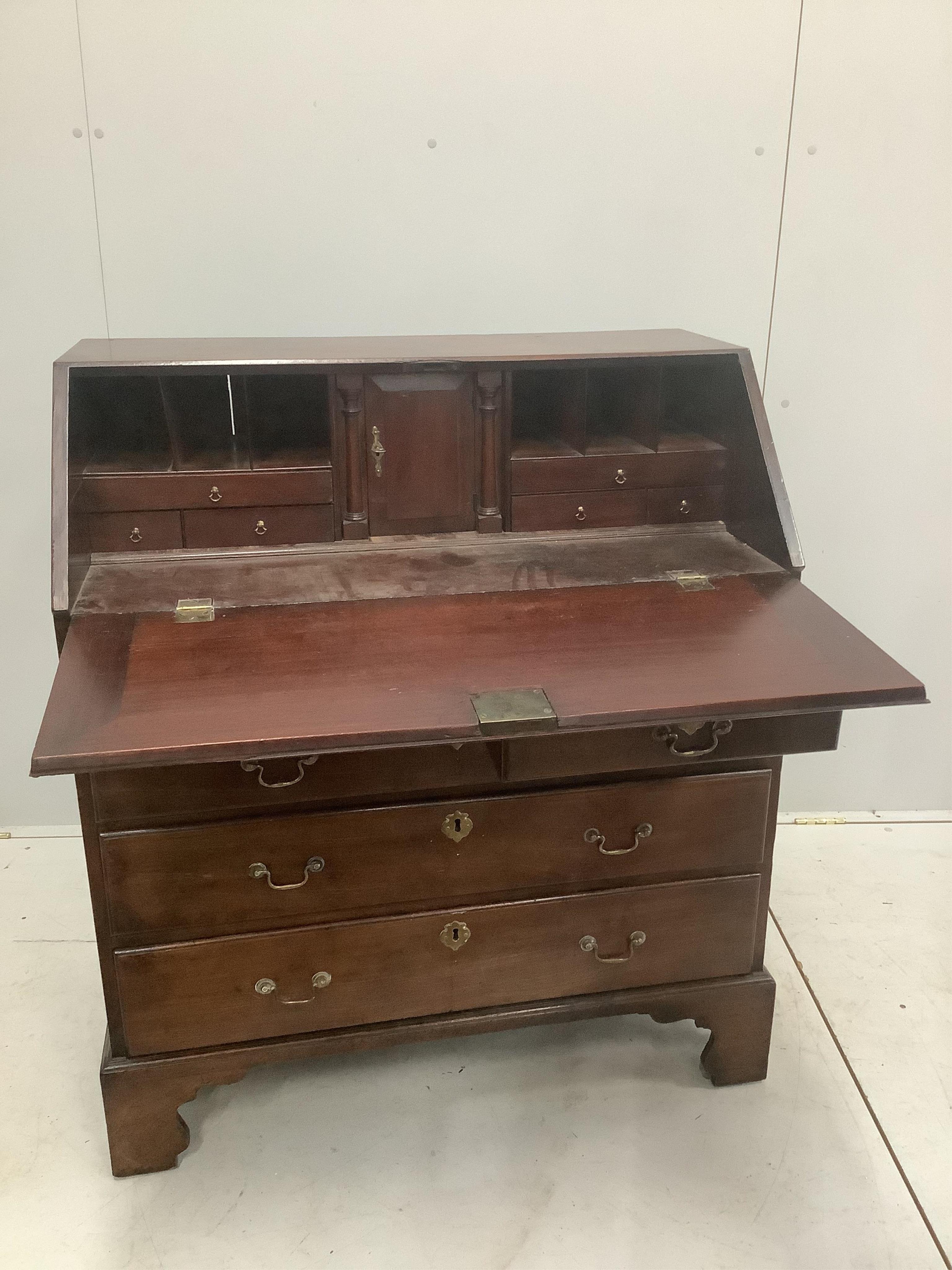 A George III mahogany bureau, width 91cm, depth 52cm, height 105cm. Condition - poor